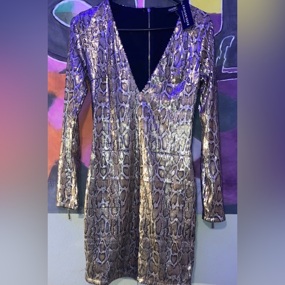 Serpent surprise dress in multicolor from fashion nova, never worn tag still on!